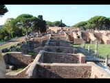 01013 ostia - regio ii - insula iv - terme di nettuno (ii,iv,2) - blick ri westen zum theater - re - palaestra.jpg